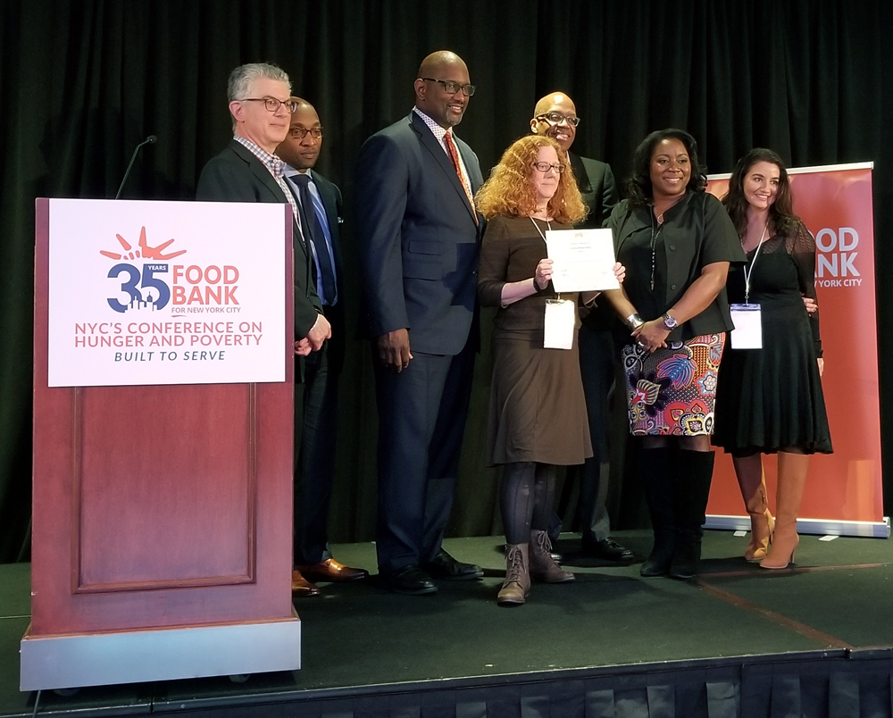 Lucia Russett, Director of our Advocacy/Food Pantry program, received the Founding Partner Award on behalf of LSA Family Health Service.