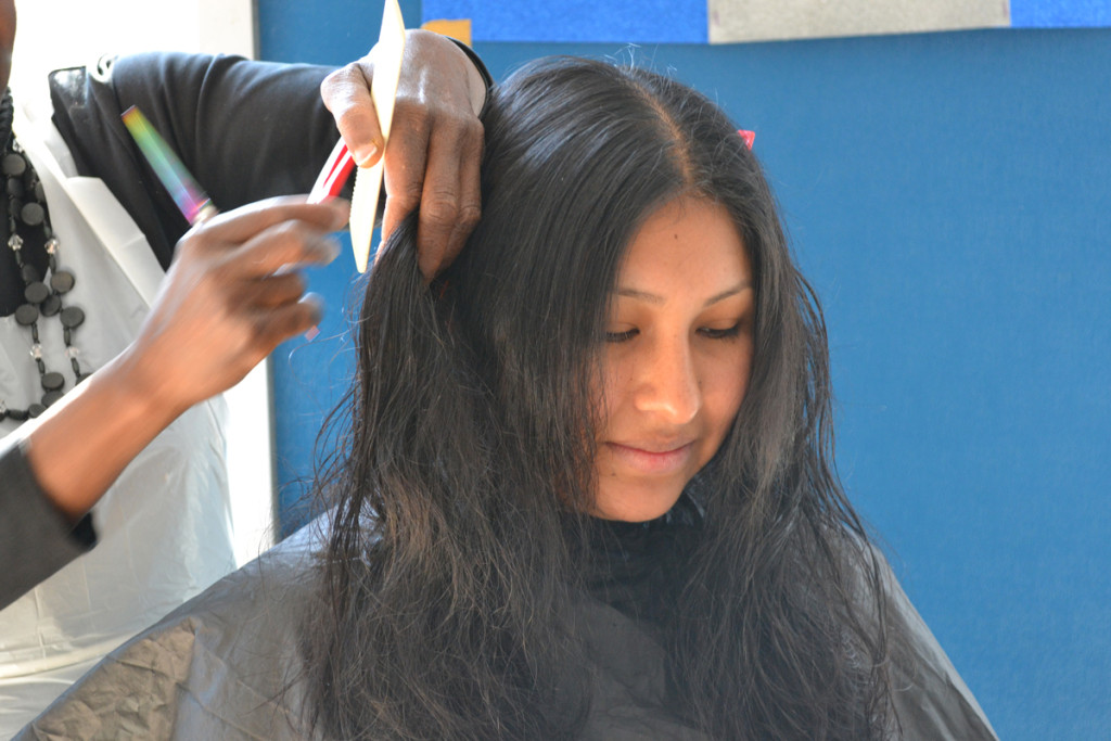 An LSA mom gets a haircut on International Women's Day